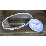 A blue and white porcelain plate with Dutch Girl pattern together with an oval wall mirror with