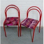 A pair of tubular red metal side chairs with upholstered seats, (2) 84 x 44cm