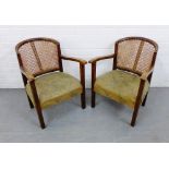 A pair of vintage oak and cane back tub chairs, 69 x 54cm (2)