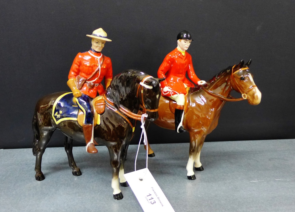 A Beswick horse model with a show jumper wearing in red jacket, together with another of a mounted