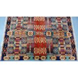 A contemporary multi coloured rug 240 x 168cm