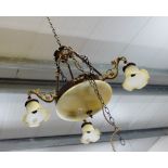 A contemporary faux brass and opaque glass light fitting