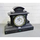A black slate and malachite inlaid mantle clock of architectural form, the enamel dial inscribed
