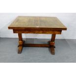 An oak dining table, 75 x 108cm