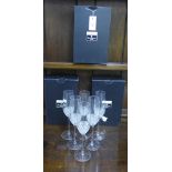A Waterford set of twelve Lume patterned champagne flutes (12) boxed
