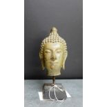 A patinated bronze Buddha head on square plinth base, 15.5cm high