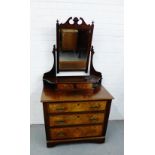 A mahogany and burr wood dressing table, the mirror with a broken swan neck pediment on shaped