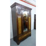 A mahogany and burr wood mirror door wardrobe with a cornice top and long drawer to the base on