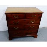 A mahogany chest, the rectangular top with moulded edge, over two short and three long drawers, on