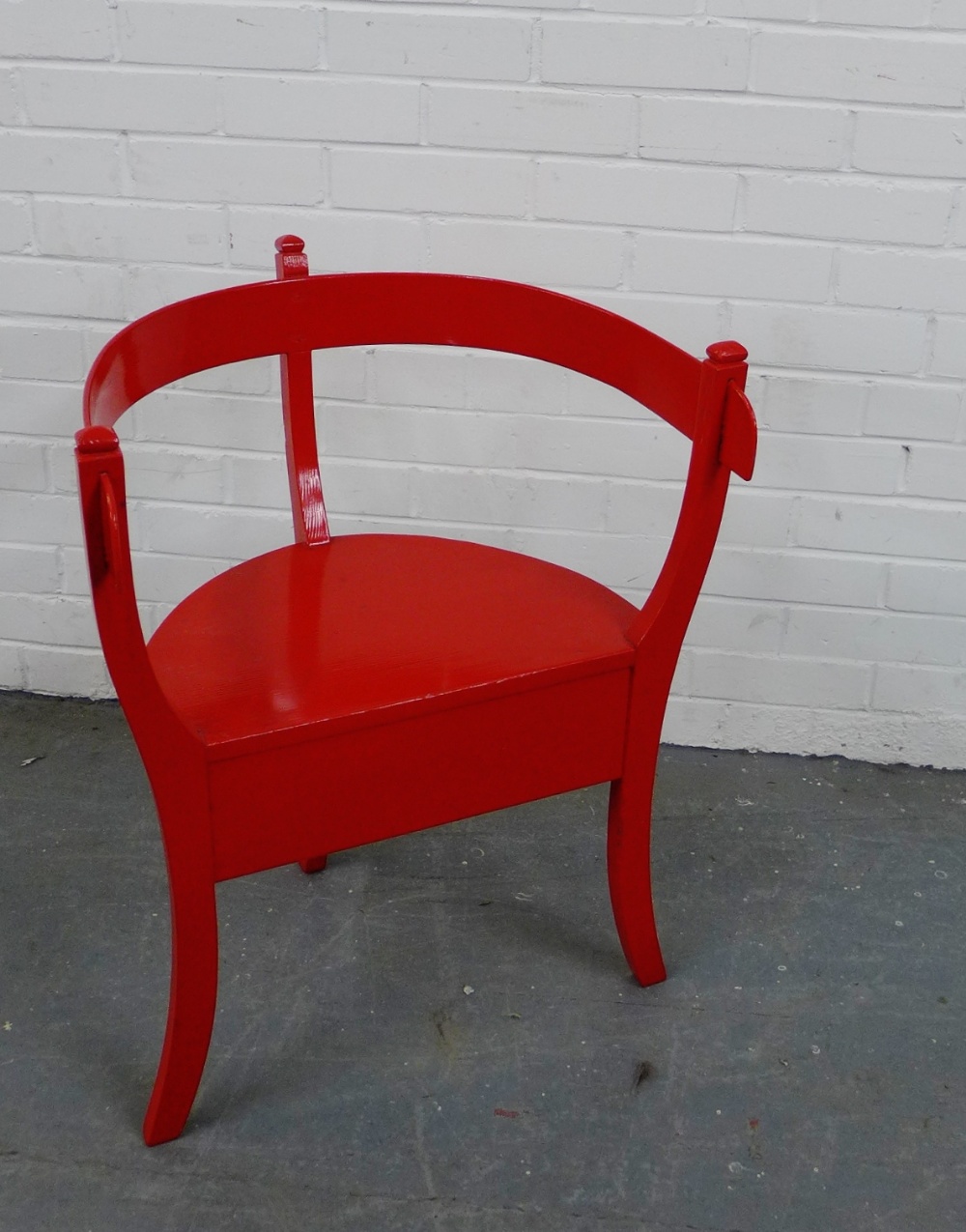 A red painted corner chair of stylised Oriental form , 72 x 55cm