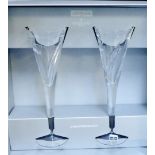 John Rocha for Waterford Millennium a pair of crystal champagne flutes, boxed
