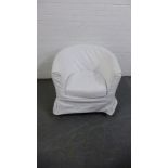 A contemporary bedroom chair with removable white cotton cover