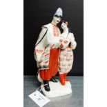 A Kiev Russian porcelain figure group, 20cm high