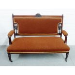 An Edwardian mahogany framed two seater with upholstered back and seat 94 x 134cm