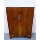 An oak Art Deco wardrobe with stylised floral moulding, 118 x 83cm