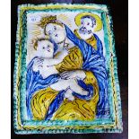 A Majolica rectangular wall plaque depicting the Virgin Mary and Baby Jesus, restored, 40 x 30cm