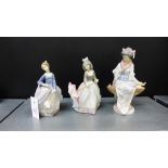 Three Lladro porcelain figures to include a Geisha girl (a/f), together with two smaller models of