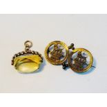 A 9 carat gold mounted citrine fob together with a Victorian coin brooch (2)