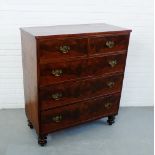 A flame mahogany chest, the rectangular top over two short and three long drawers, raised turned