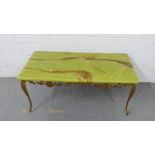 A faux onyx and gilt metal side table, 40 x 92cm