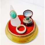 A 9 carat gold dress ring with green hardstone cabouchon together with a turquoise set dress ring