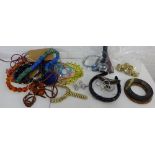 A mixed lot to include amethyst and jade bead necklaces, horn bracelets, various costume jewellery