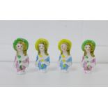 Four porcelain dolly heads, (4)