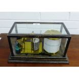 A glazed barograph, 35 x 19cm