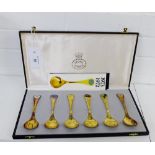 A cased set of six Georg Jensen silver gilt and enamel year spoons, dated 1971 - 1976 (6)