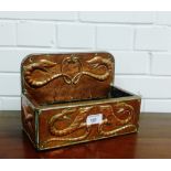 An oak and copper bound Arts & Crafts stationary box with a serpent pattern, 26 x 18cm