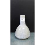 A Ruskin bottle neck vase in a grey speckled glaze with impressed mark and number 1915 to base, 20cm