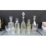 A quantity of 19th century and later decanters, stoppers, condiment bottles, a drinking glass and