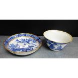 A Chinese blue and white Pagoda patterned circular dish, 16cm diameter, and bowl, 6.5cm high (2)