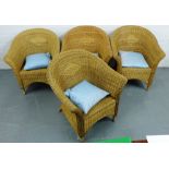 A set of four conservatory basket weave tub chairs together with a set of four pale blue scatter