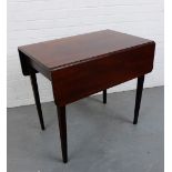 A mahogany drop flap table on square tapering supports 74 x 82cm