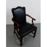 A mahogany framed open armchair with upholstered back and seat with studhorse to outer edges, on