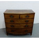 A mahogany and inlaid bow front chest, with two short and three long drawers and bracket supports