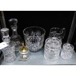 A quantity of cut glass and crystal to include an ice bucket, water jug, biscuit barrel, two
