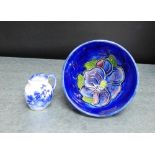 A Moorcroft anemone patterned tube lined blue bowl, 9cm diameter, together with a miniature Royal