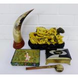 A mixed lot to include a carved resin Temple Dog figure, a dragon carved horn, a brass trinket box