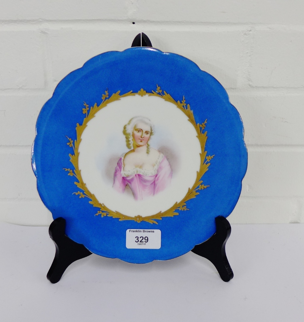 A Sevres porcelain cabinet plate with Celeste bleu border and Marquise portrait to centre, (rim with