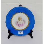 A Sevres porcelain cabinet plate with Celeste bleu border and Marquise portrait to centre, (rim with