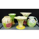 A collection of five various Kensington Price Art Deco vases, jugs and flower posies, all painted