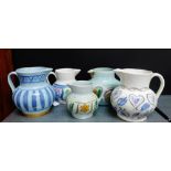 A collection of five vintage Buchanan pottery jugs, tallest (18cm), (5)