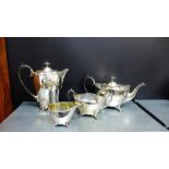 A four piece Epns tea and coffee set comprising coffee pot, tea pot, cream jug and twin handled