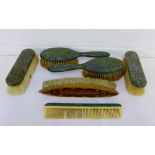 Early 20th century shagreen backed clothes and hair brushes, a comb and a vintage Forsyth's