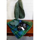 A boys full highland outfit retailed by Aitken & Niven of Edinburgh comprising green wool jacket,