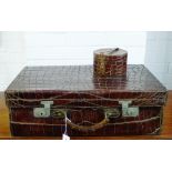 An early 20th century brown leather crocodile skin suitcase, 60 x 40cm together with small