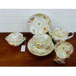 A quantity of 19th century English porcelain tea wares painted with floral sprays and gilt edged,