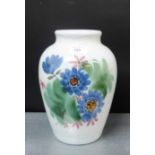 A Buchan pottery blue glazed floral patterned high shouldered baluster vase, 28cm high